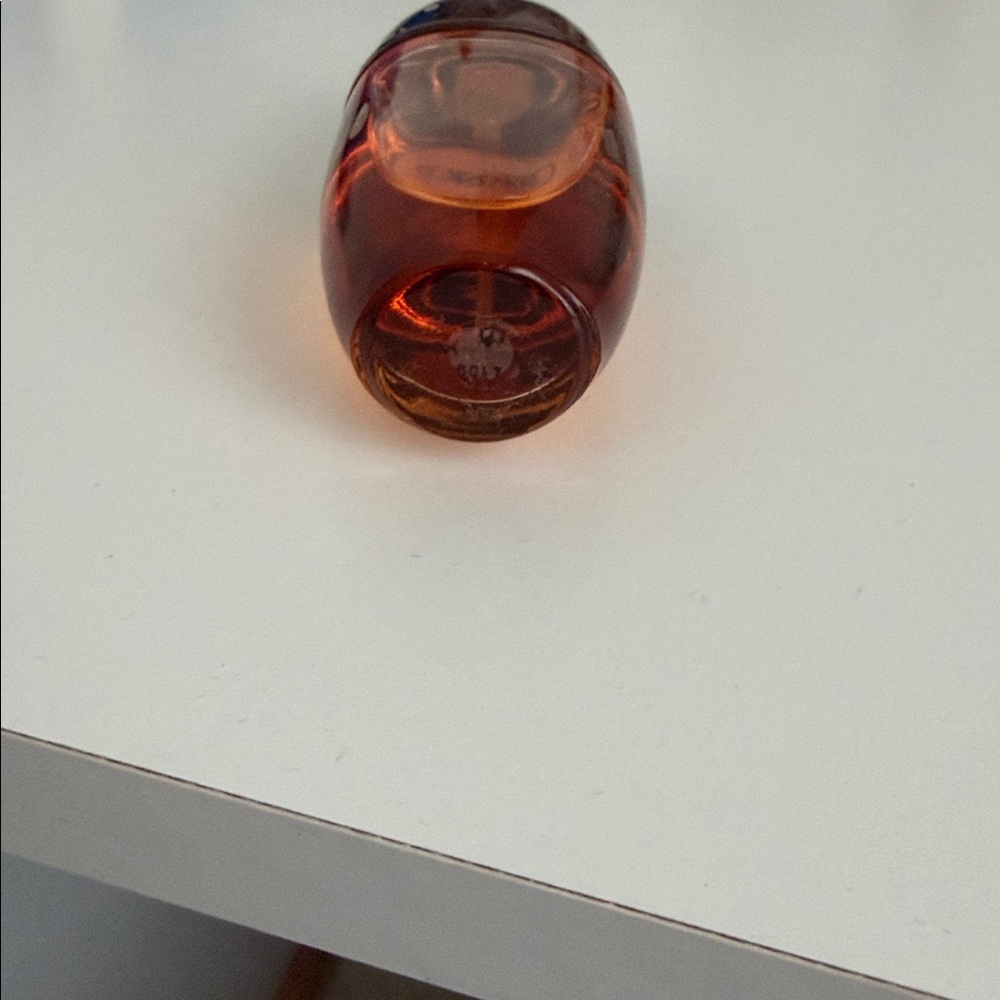 Calvin Klein Obsession Fragrance with Rich Brown and Orange Hues - Picture 3 of 4